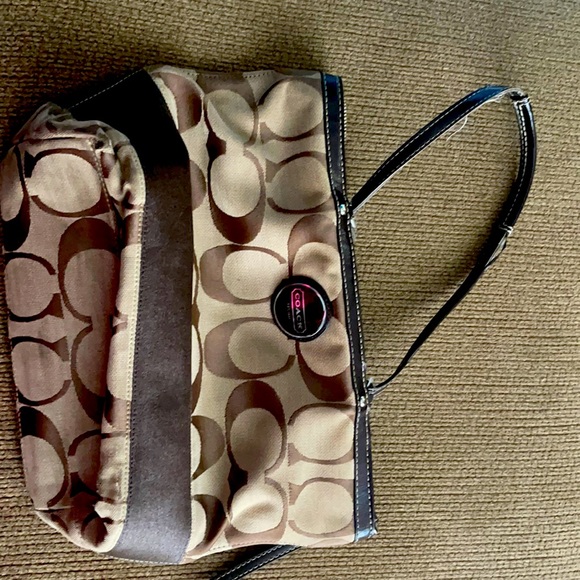 Brown and tan coach purse. - Picture 1 of 2